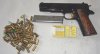 IWG Mod.Governement, Kaliber 9mm P.A.K. schwarz brüniert, Griffschalen mit Figuren, Abzug und Hahn g