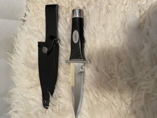 Schweres Messer mit Flaschenöffner