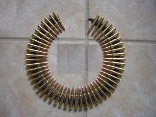 Dekomunition .323/8x57is, 50 Stück auf Gurt MG42,MG34