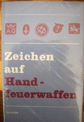 ZEICHEN AUF HANDFEUERWAFFEN